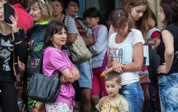 Половина українських біженців не хочуть жити за кордоном - опитування